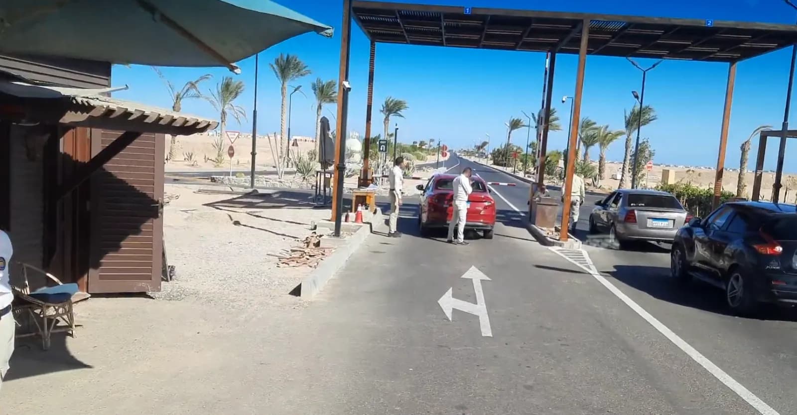 Outer vehicle access control gate at El Gouna during a hotel transfer